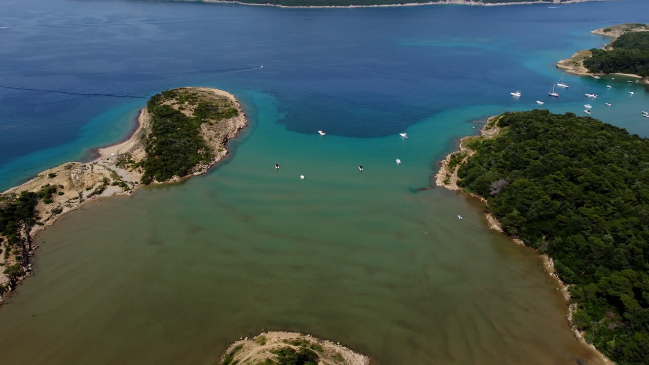 Rab, Adriatic Sea, Croatia - A Picturesque Scene of Boats Moored by Verdant Islands and Sandy Shores - Aerial Drone Shot
