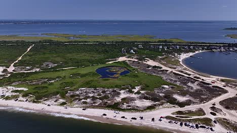 an aerial shot of sour thumb beach, ny on long island