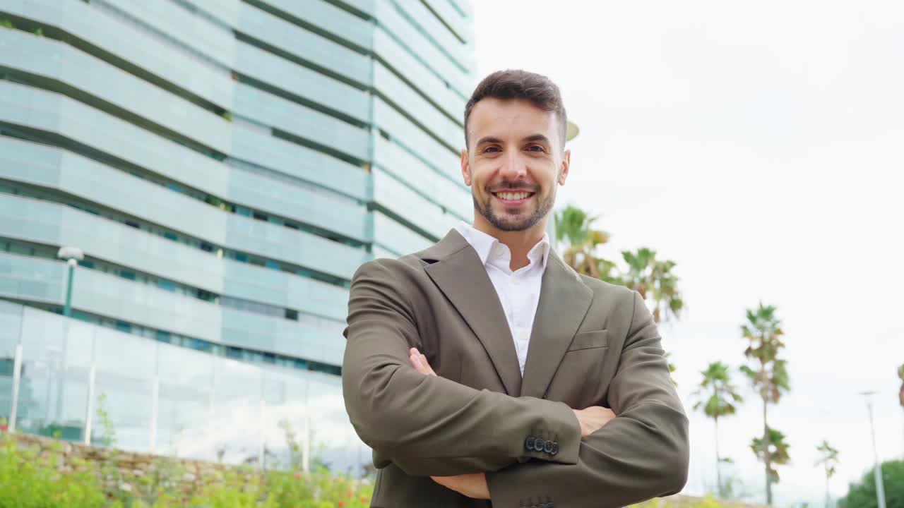 Professional businessman in suit near office building