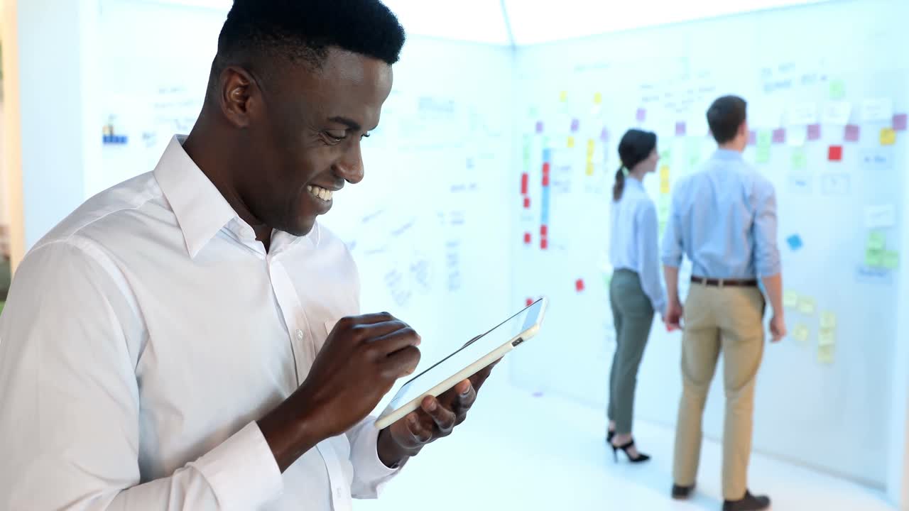 Male executive using digital tablet 4k