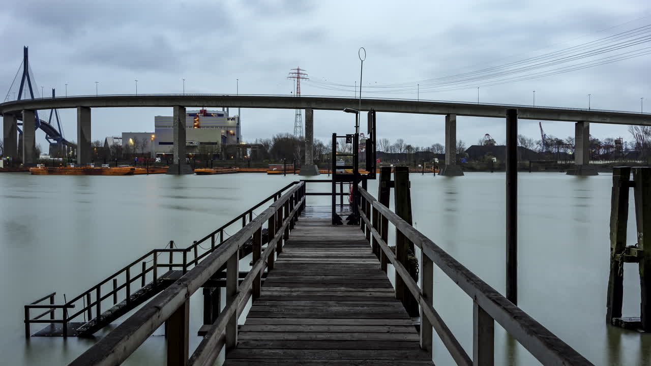 Hamburg harbor night-to-day time lapse looking from jetty to Koehlbrandbridge
