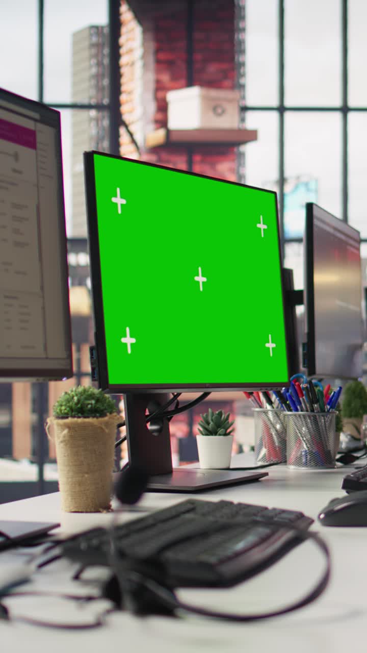 Vertical video Customer support office with green screen PC used to assist customers