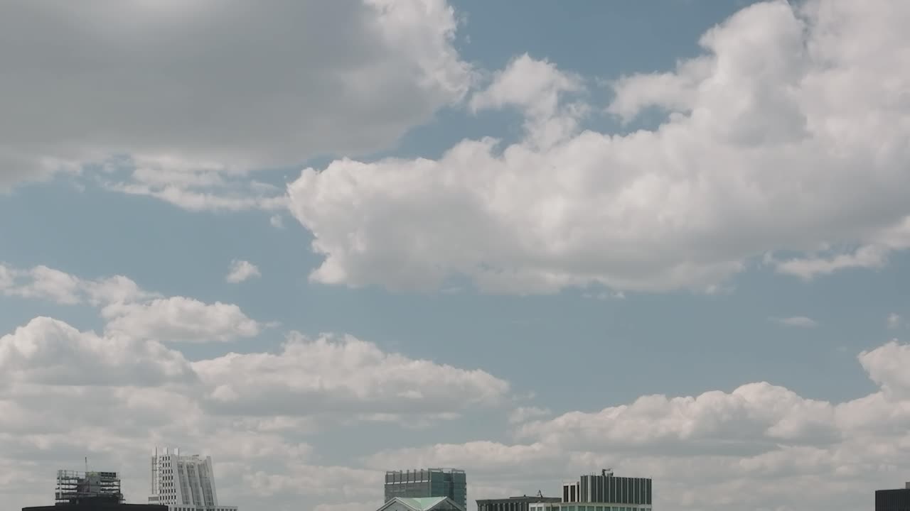 Chicago aerial view showcases cityscape under cloudy sky