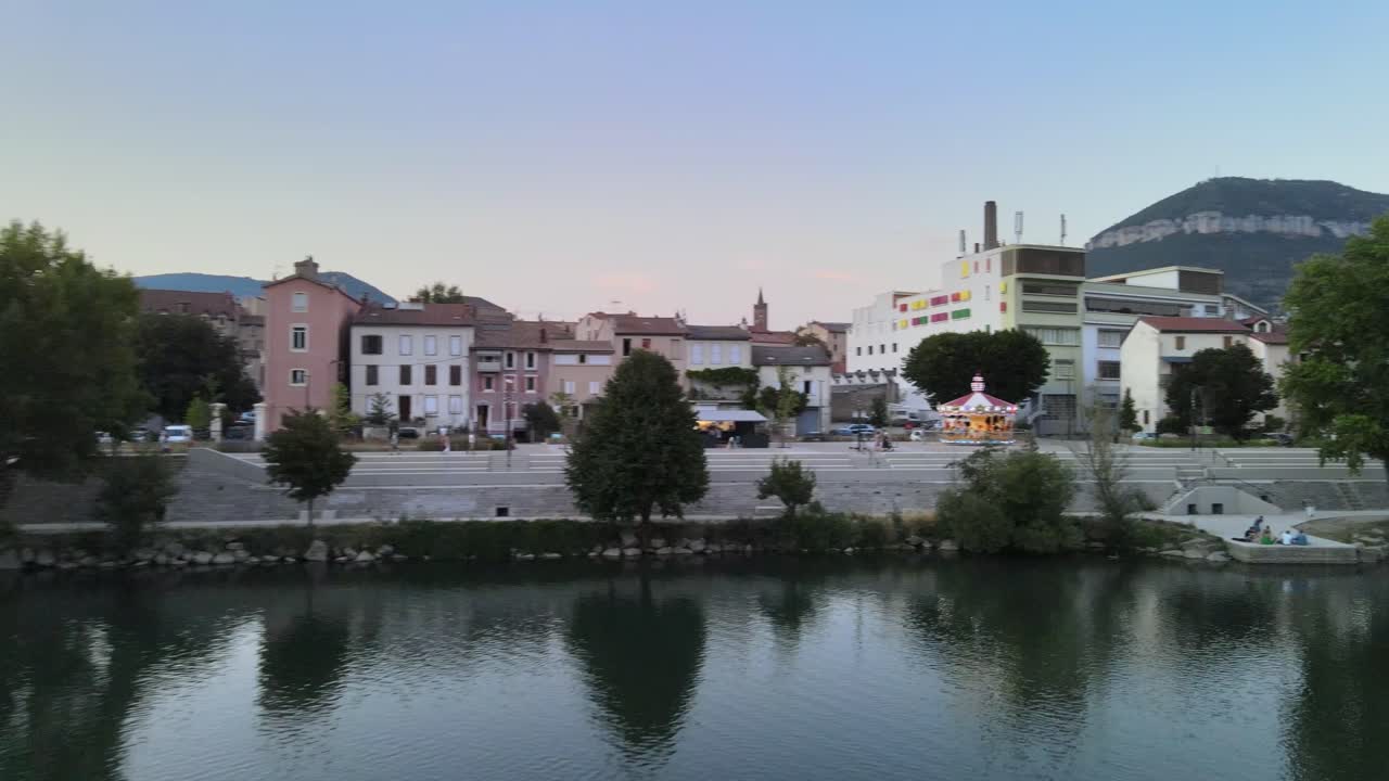 Beautiful sunset over the river of the city of Millau (France)