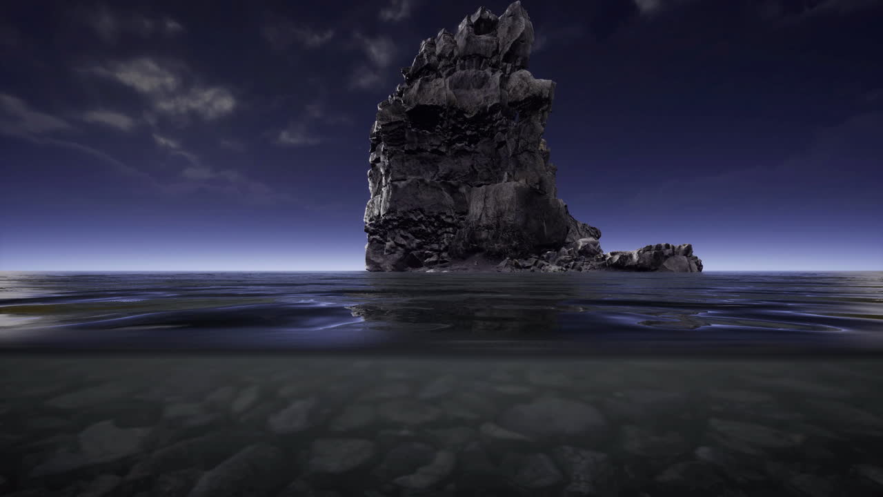 Rock formations rise above tranquil waters during twilight hours