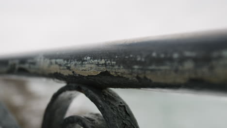 Scratched-iron-handrail-dolly-close-up-at-Niagara-Falls-NY-Canada-North-America