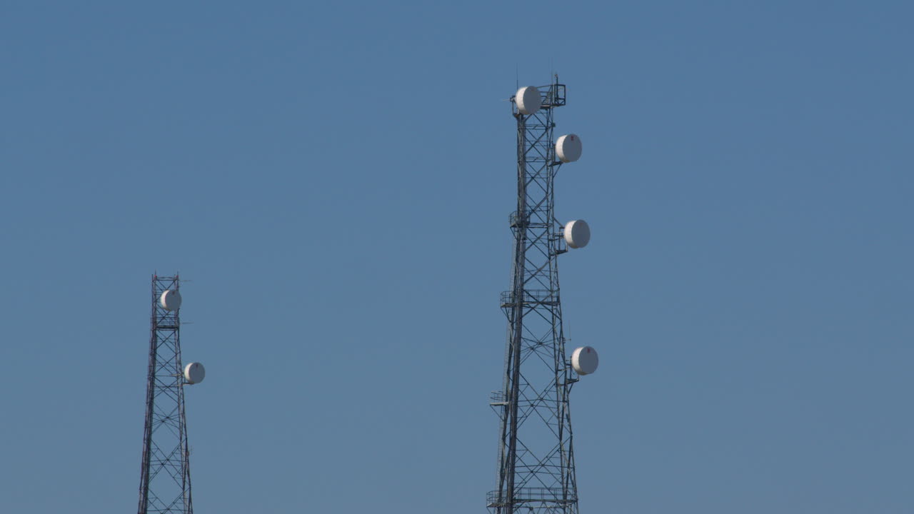 Mid shot of a communication mast tower at Bacton