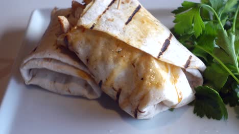 Chicken-warp-and-fresh-salad-on-table