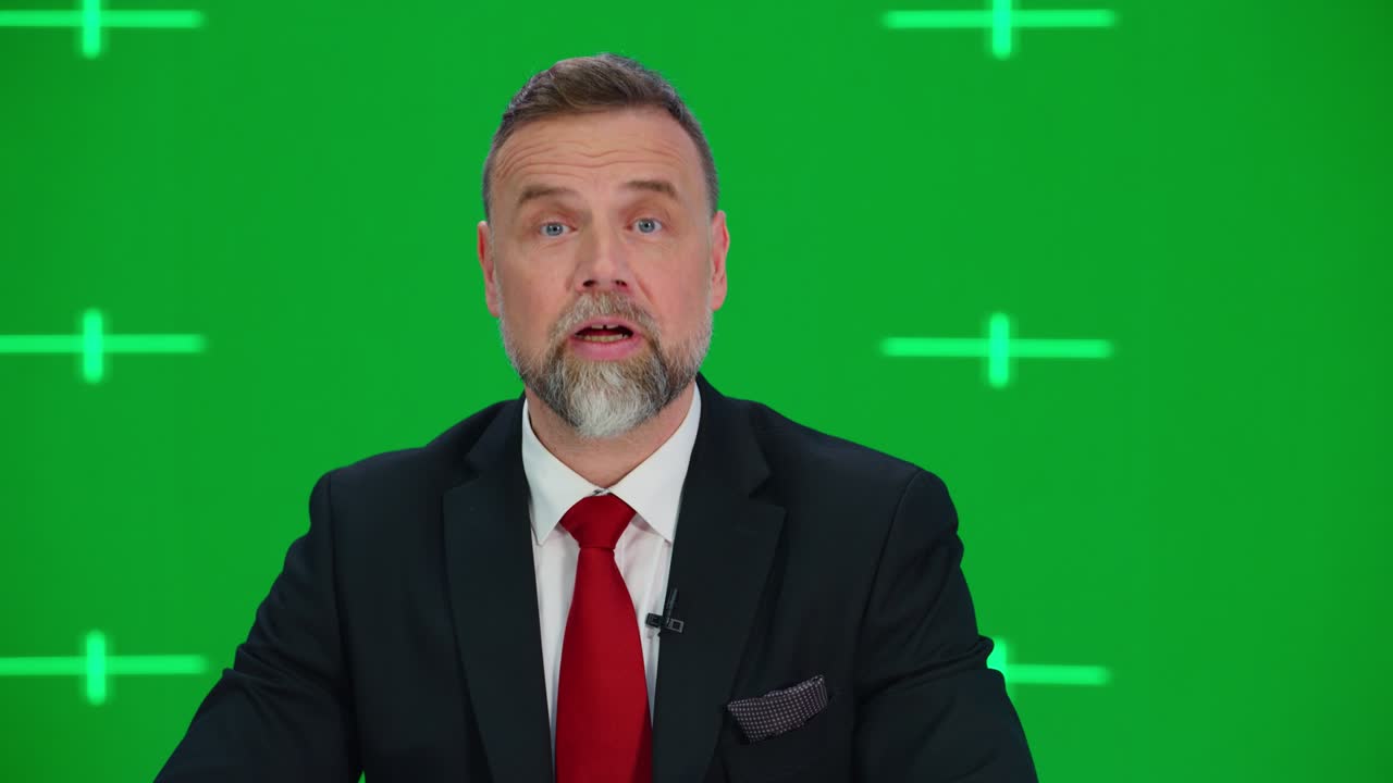Newsroom TV Studio Live News Program with Green Screen Background: Male Presenter Reporting, Talking and Listening. Television Cable Channel Anchor. Network Broadcast Mock-up Playback. Static Medium