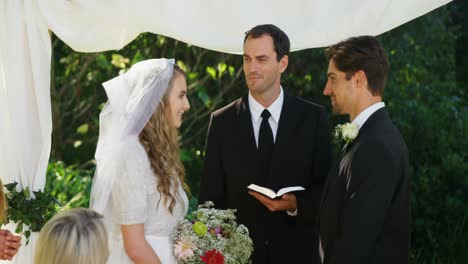 Couple-looking-at-each-other-during-wedding-4K-4k