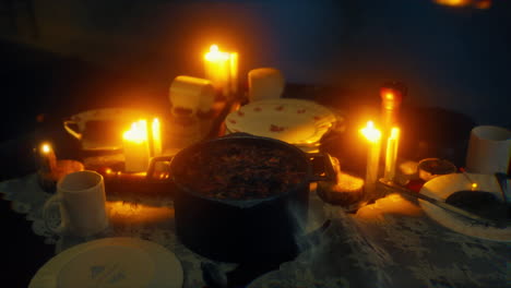 table setting in candlelight at night