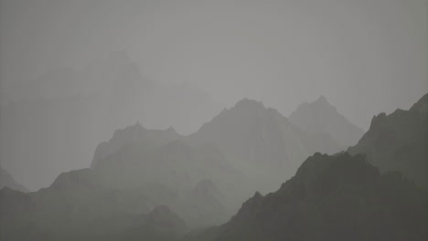 misty mountain landscape captured during overcast weather in the early morning