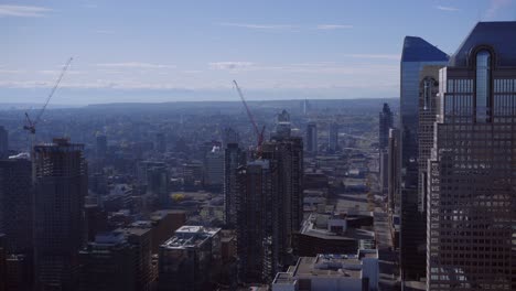 calgary skyscrapers construction cranes downtown street
