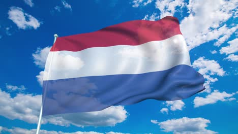 flag of netherlands with fabric structure against a cloudy sky (loopable)