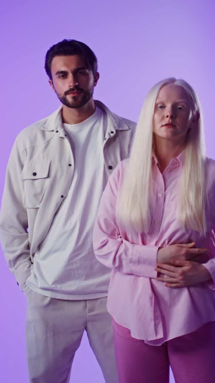 Stylish Couple Posing in Studio