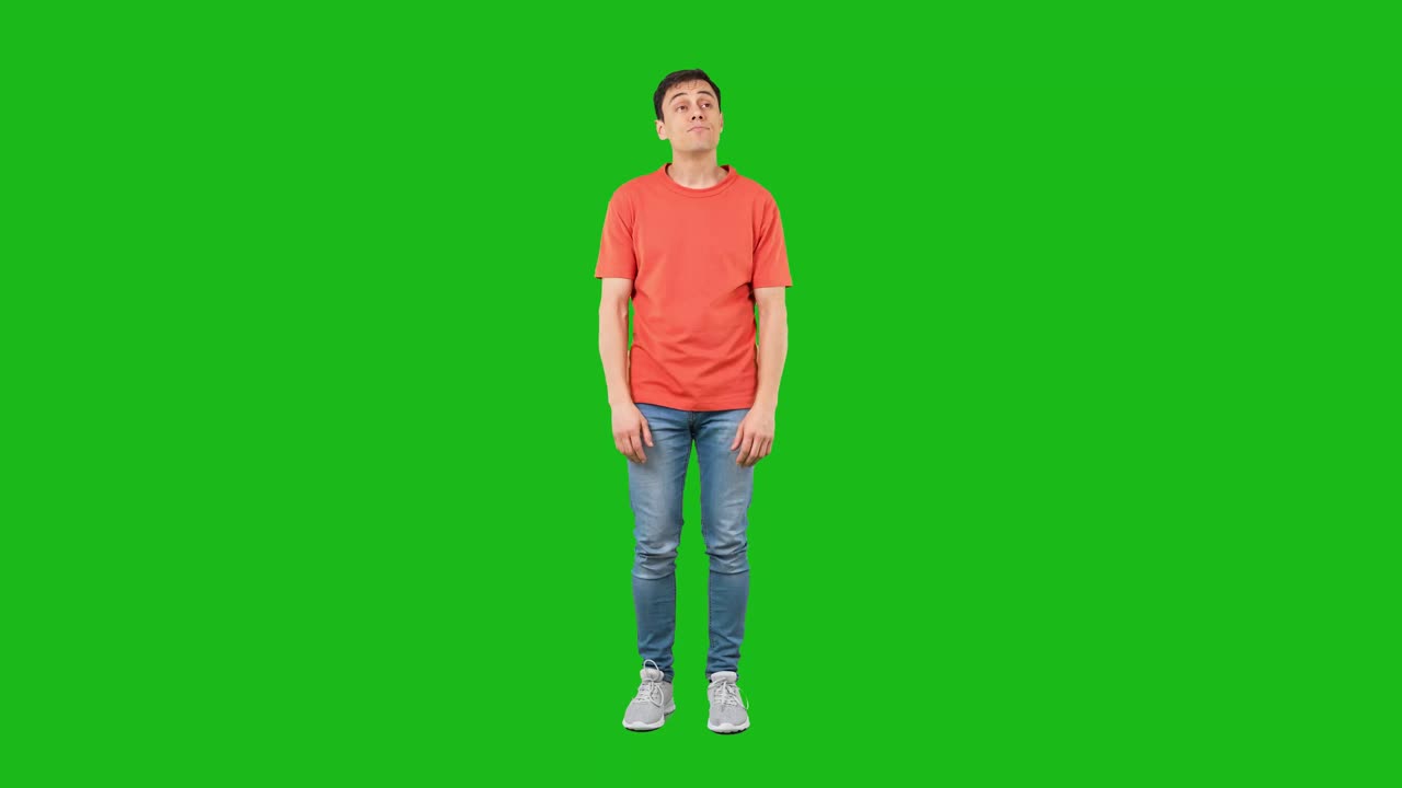 Man Covers Ears with Annoyed Expression on Green Screen