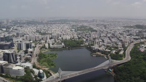 Drone-footage-shows-the-Durgam-Cheruvu-Cable-Bridge,-which-connects-Jubilee-Hills-and-Madhapur-in-Hyderabad-City,-India,-on-the-Durgam-Cheruvu-Lake