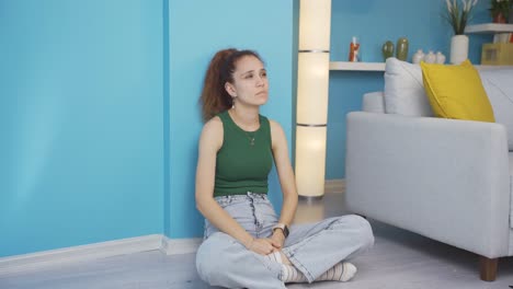 Thoughtful-woman-by-the-wall.