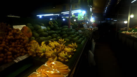 Looking-at-the-fruits-at-the-marketin-Thailand