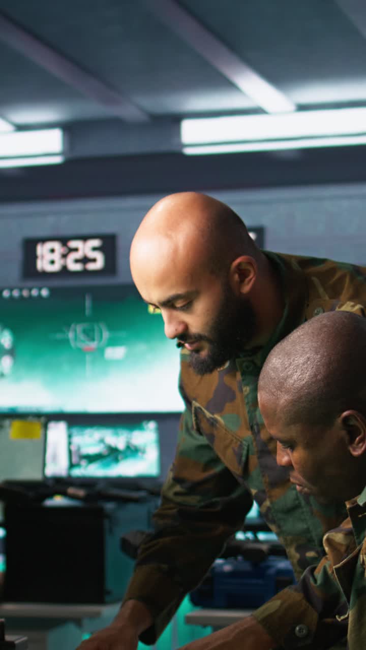 Vertical video Soldier in military HQ base doing brainstorming with coworker