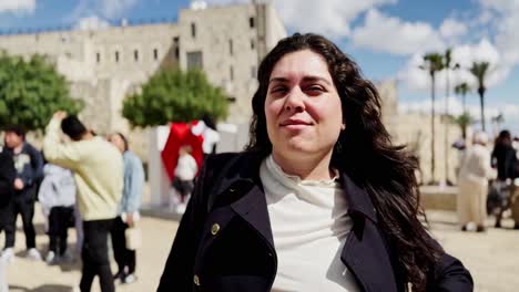 portrait of young woman tourist in jerusalem