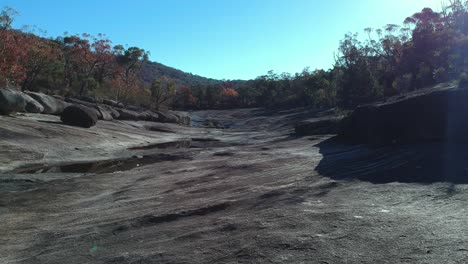 exploring a dry creek bed in outback australia