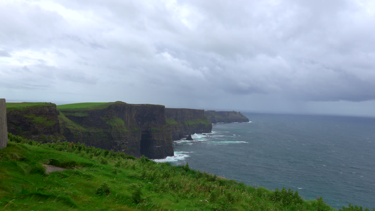 Towering above the Atlantic, the Cliffs of Moher showcase Ireland’s wild, untamed beauty. Their immense height and rugged rock formations make them an unforgettable sight.