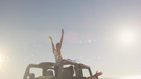 animation of light spots over caucasian woman with arms outstretched