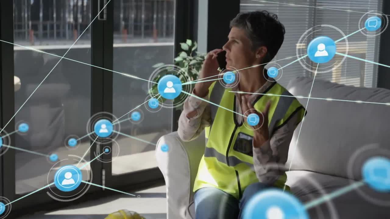 Animation of network of connections with people icons over caucasian female architect on smartphone