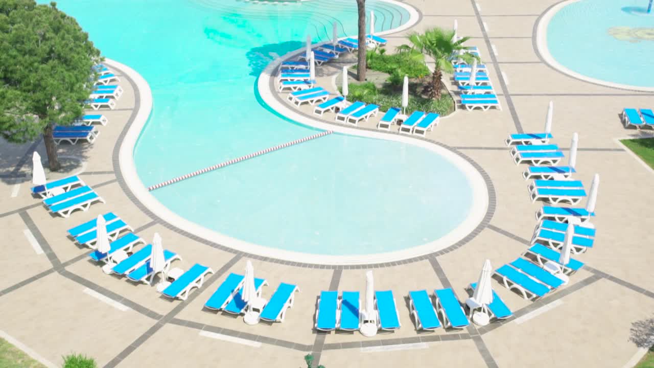 Luxury Resort Pool Complex with Multiple Pools and Cabanas