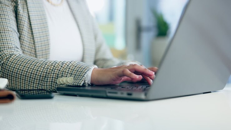 Business person, hands typing