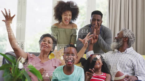 Social-media-likes-and-comments-animation-over-happy-family-celebrating-together