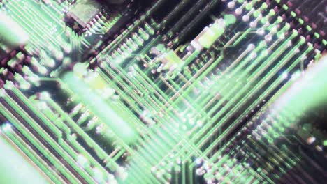 Pulsating-glow-of-bright-circuit-board-wires-green-retro-feel-of-electronics