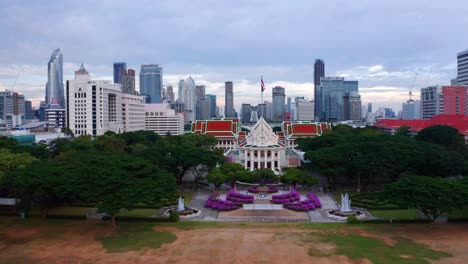 a view of chulalongkorn university with the monument of king chulalongkorn and king vajiravudh in the city of bangkok, thailand