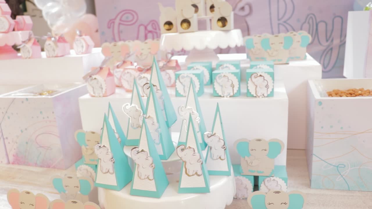 Sweets in decorative boxes, baby elephant theme in pink and blue