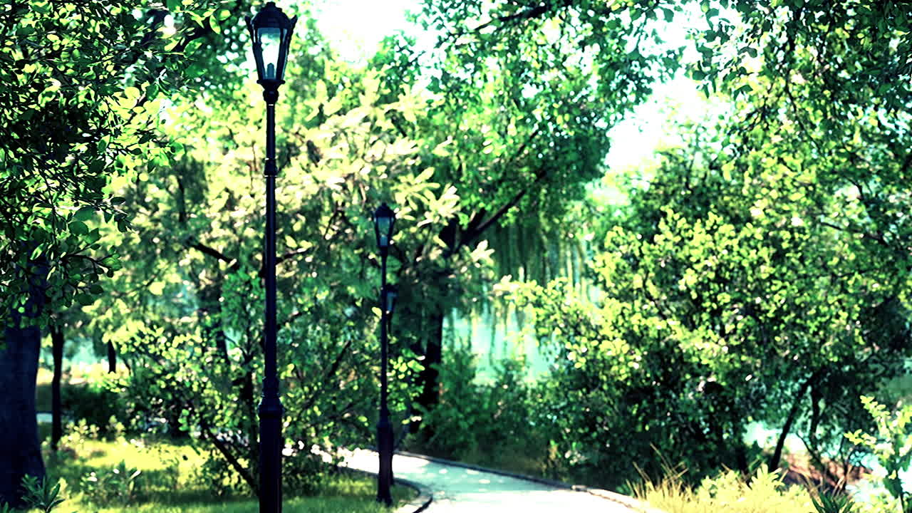 평화로운 초록색 도시 공원을 가로질러 휘어지는 돌길의 경치 좋은 전망