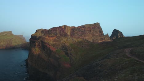 Drone-view-of-rocky-cliffs-on-the-beach-in-Madeira-island,-Portugal