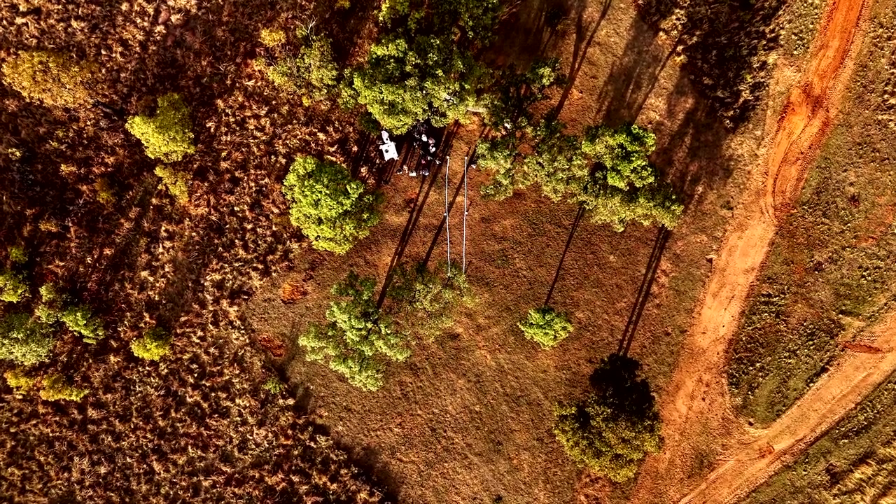 Outdoor elegant bush wedding in the wilderness, aerial zoom-in