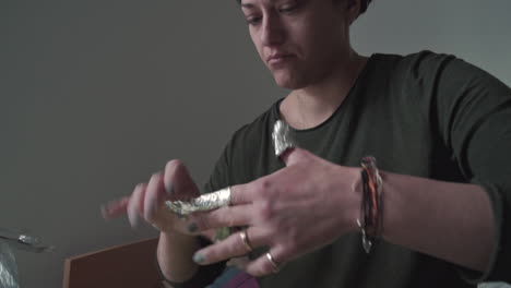 CLOSE-UP-Footage-of-a-caucasian-woman-taking-manicure-indoors