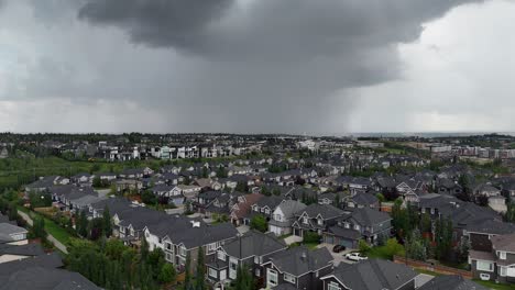 thunderstorms rolling in over the suburbs of calgary, alberta in summer