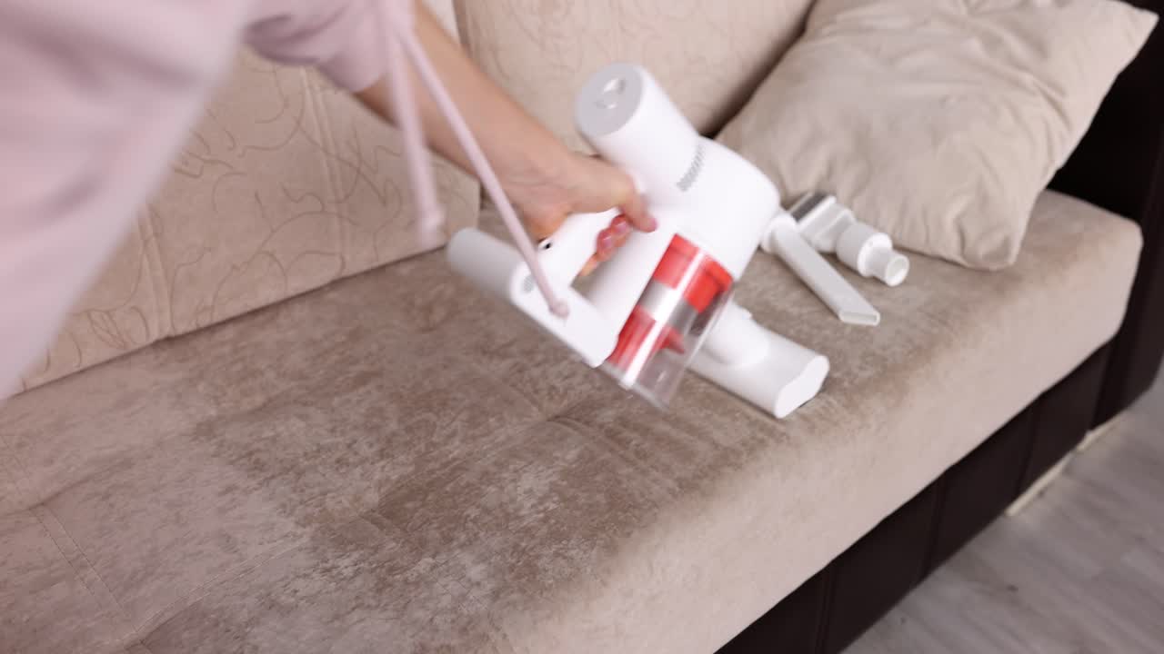 Vacuuming the couch
