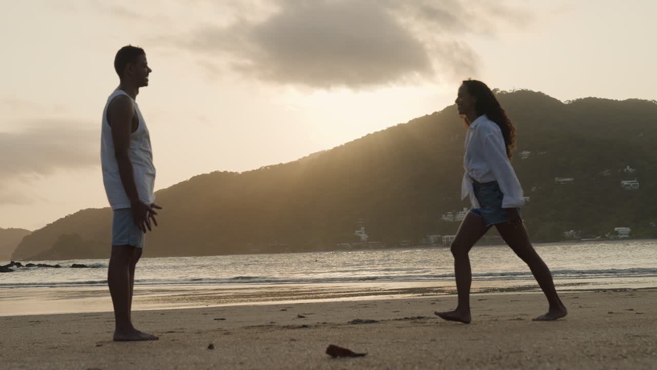 Woman jumping on his boyfriend's arms