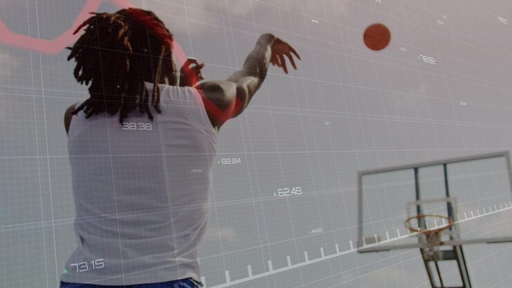 Male shooter raising ball and releasing, practicing sinking shot while grid red line tracking