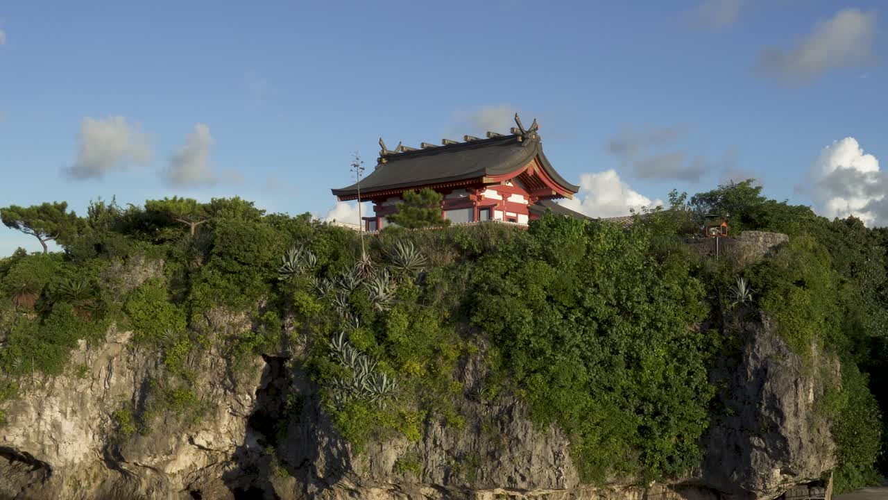 View of Naminoue Shrine and temple - 4K view of Naha, Okinawa, Japan, clear blue sky and clouds. In daytime. Summer holiday, vacation