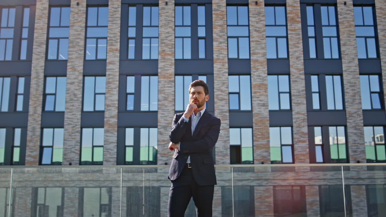 Thoughtful boss thinking career growth at business district. Manager pondering