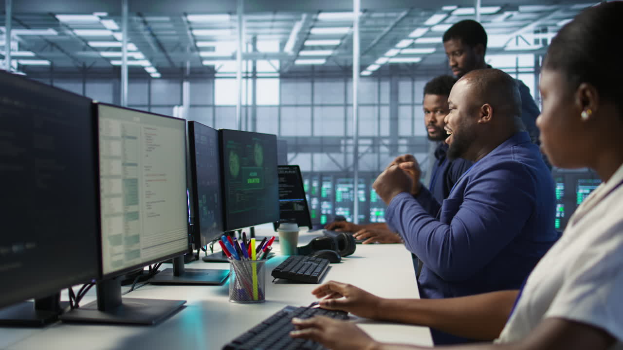 Team of IT Professionals Working in a Server Room
