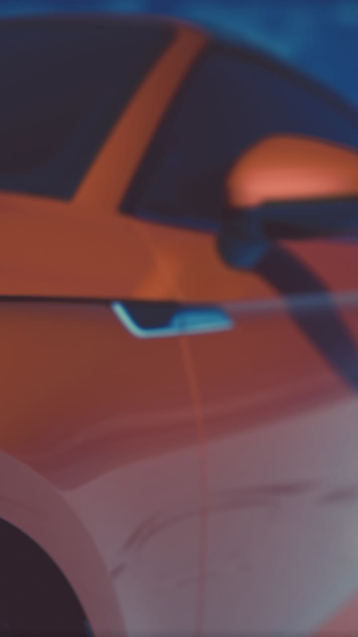 primer plano del lado de un coche rojo