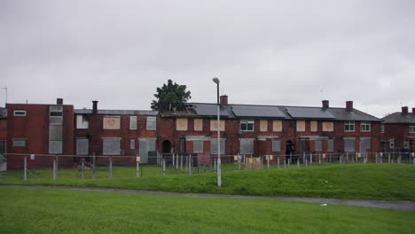 wide shot of multiple fire damaged homes in blackburn, uk