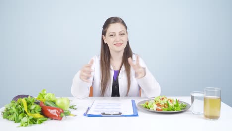 nutritionist laughing at camera.