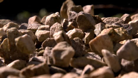 pebbles falling onto more pebbles